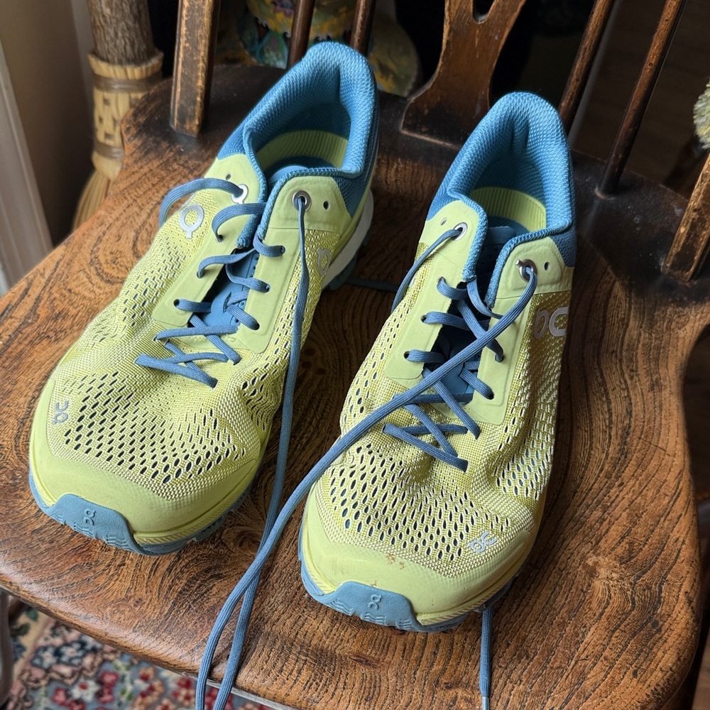 On Running Yellow and Gray Athletic Shoes
